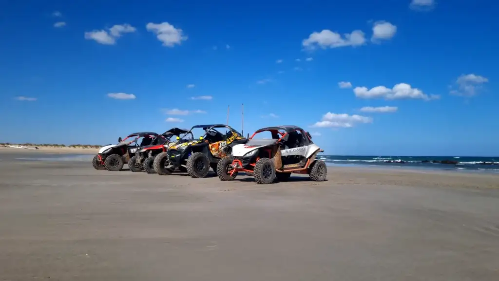 FOX ATVs side-by-side vehicles on the beach beside the Arabian Sea in Oman