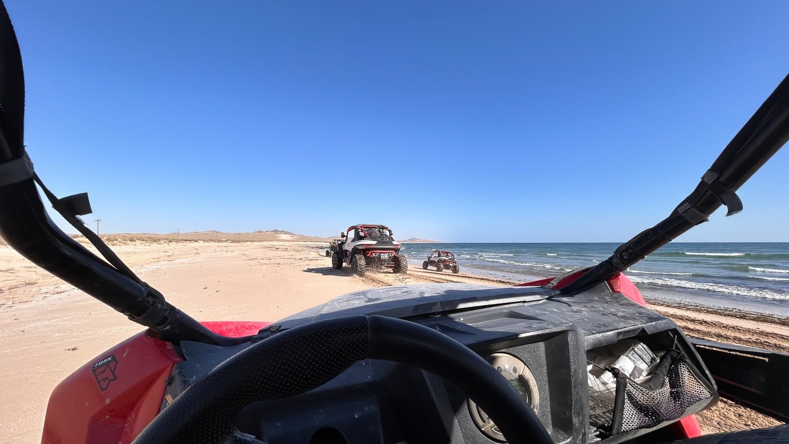 View from a FOXATVs buggy following a convoy along the coast in Oman